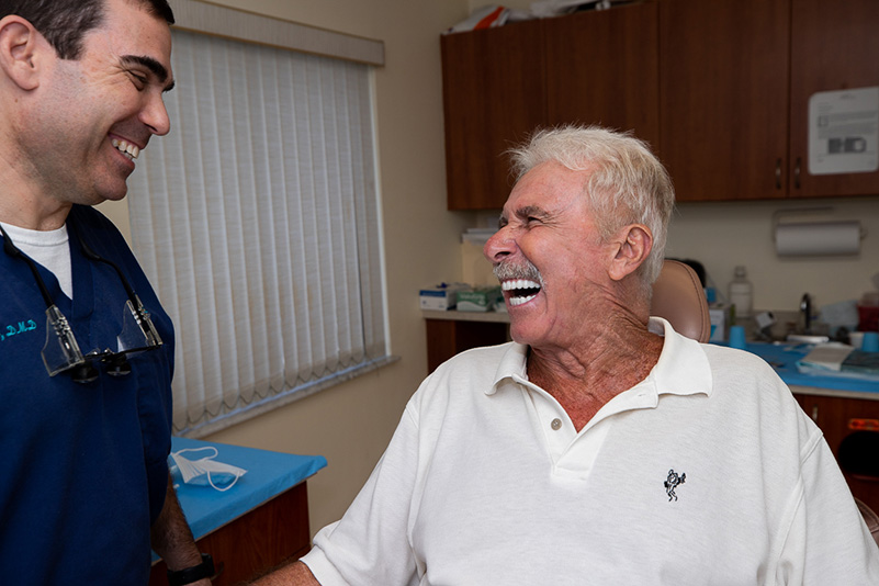 patient smiling after dental implants