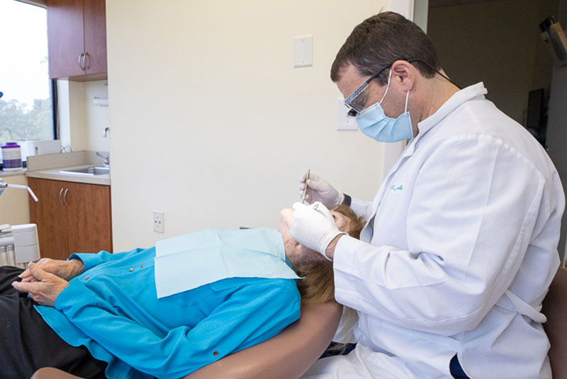dental patient getting periodontal maint