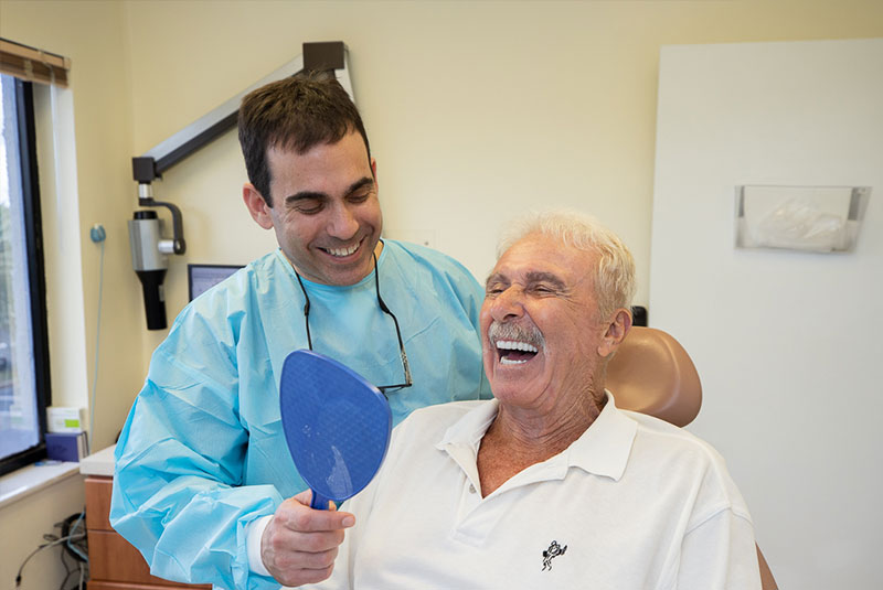 Dr. Brian ferber with dental patient